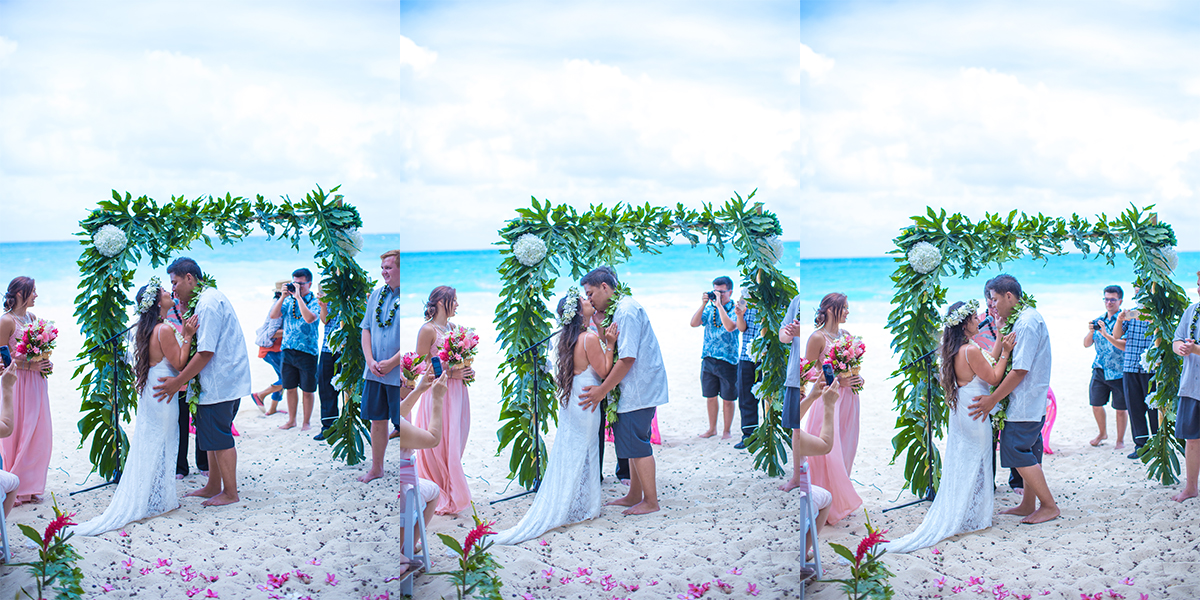 The moment of the lei kiss during the actual wedding in Waimanalo