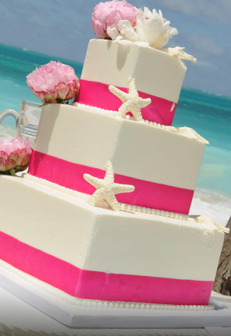 square wedding  cake with pink ribbon Hawaii 