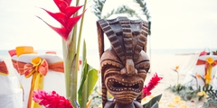 close up of a Hawaiian tiki for a beach wedding