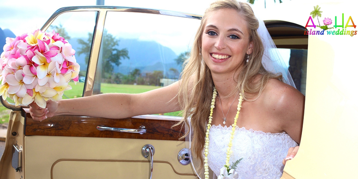 bride getting out of the Rolls Royce for her wedding at an estate