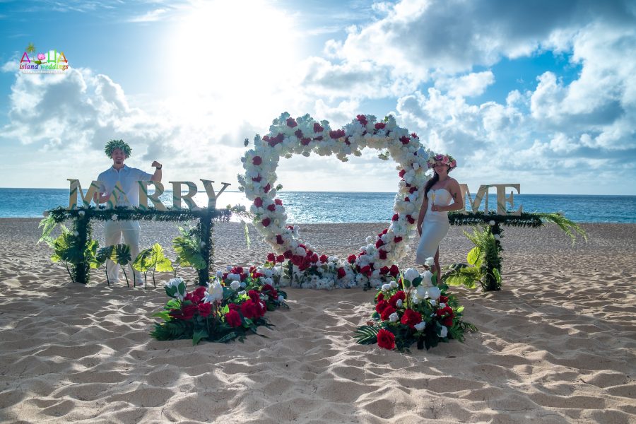 by the proposal heart on the beach