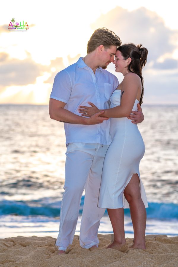 love is on the beach in Hawaii with danny nd sydney